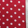 Tissu rouge vif à gros pois blancs